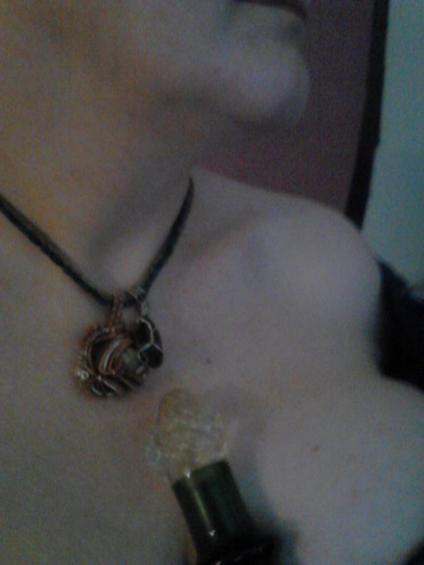 On the left is an opal... on the right, an emerald. The opal is my only son, Westley Thorin Keaton Roberts' birth stone (october). The emerald is both my birth stone and Westley's death month stone. What we see here is wire turned with the besto of intentions and acme of skill. Thank you so much wren. I'm so honored. — with Wren Déjà Vu SmilingDeer.  https://www.facebook.com/photo.php?fbid=799102313443113&set=a.151763424843675.27293.100000300558421&type=1